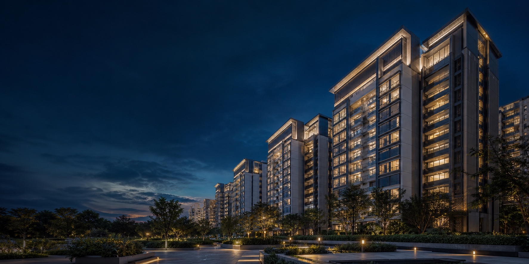 Contemporary residential development illuminated at blue hour